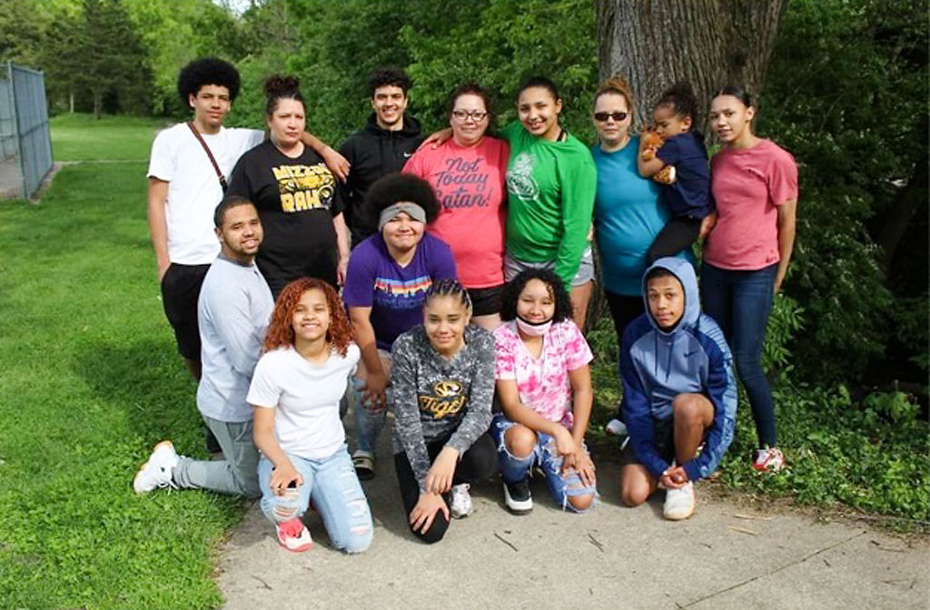 Tara Knedler, second from left in the back row, with her two sisters and their children on Mother's Day